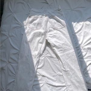 White baggy jeans with brown stitching